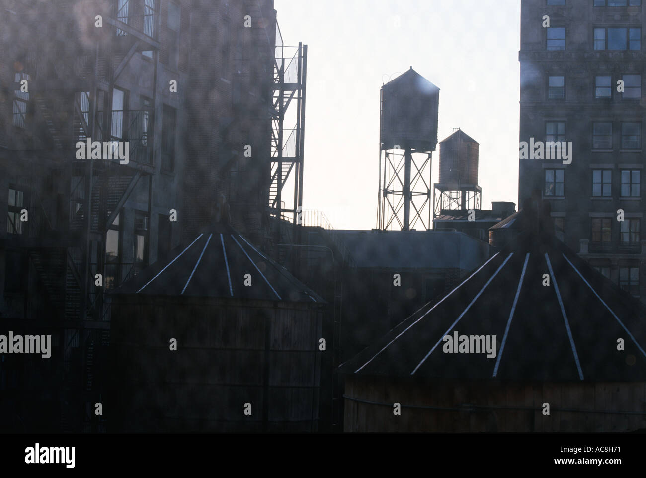 Water tanks atop NYC roofs New York City Stock Photo Alamy