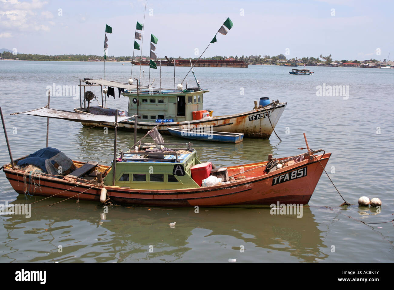 Small wooden fishing boats in Kuala Terengganu, Malaysia Stock Photo - Alamy