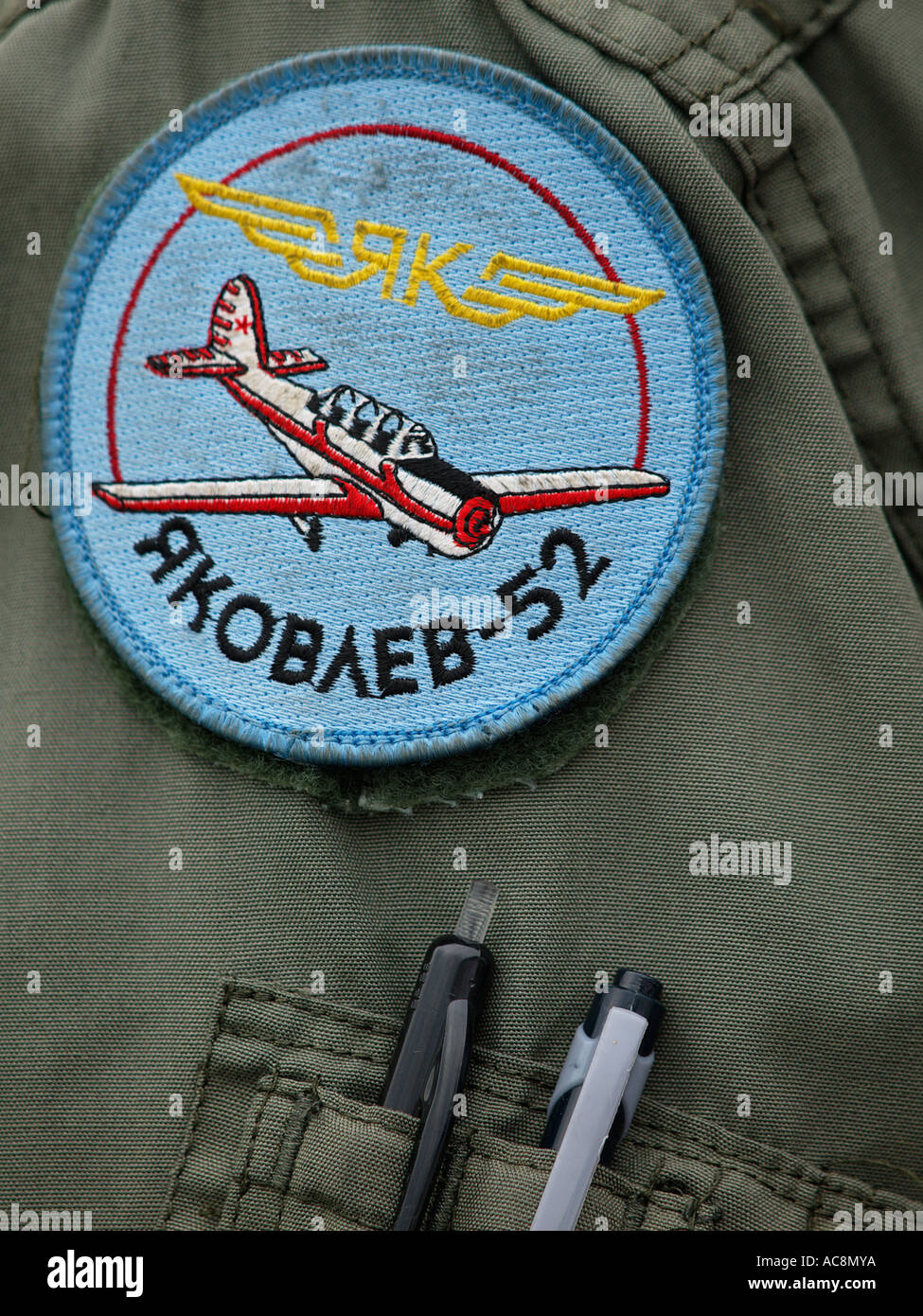 Yakovlev Yak 52 badge on pilot s khaki overall uniform Seppe Airfield Noord Brabant the Netherlands Stock Photo
