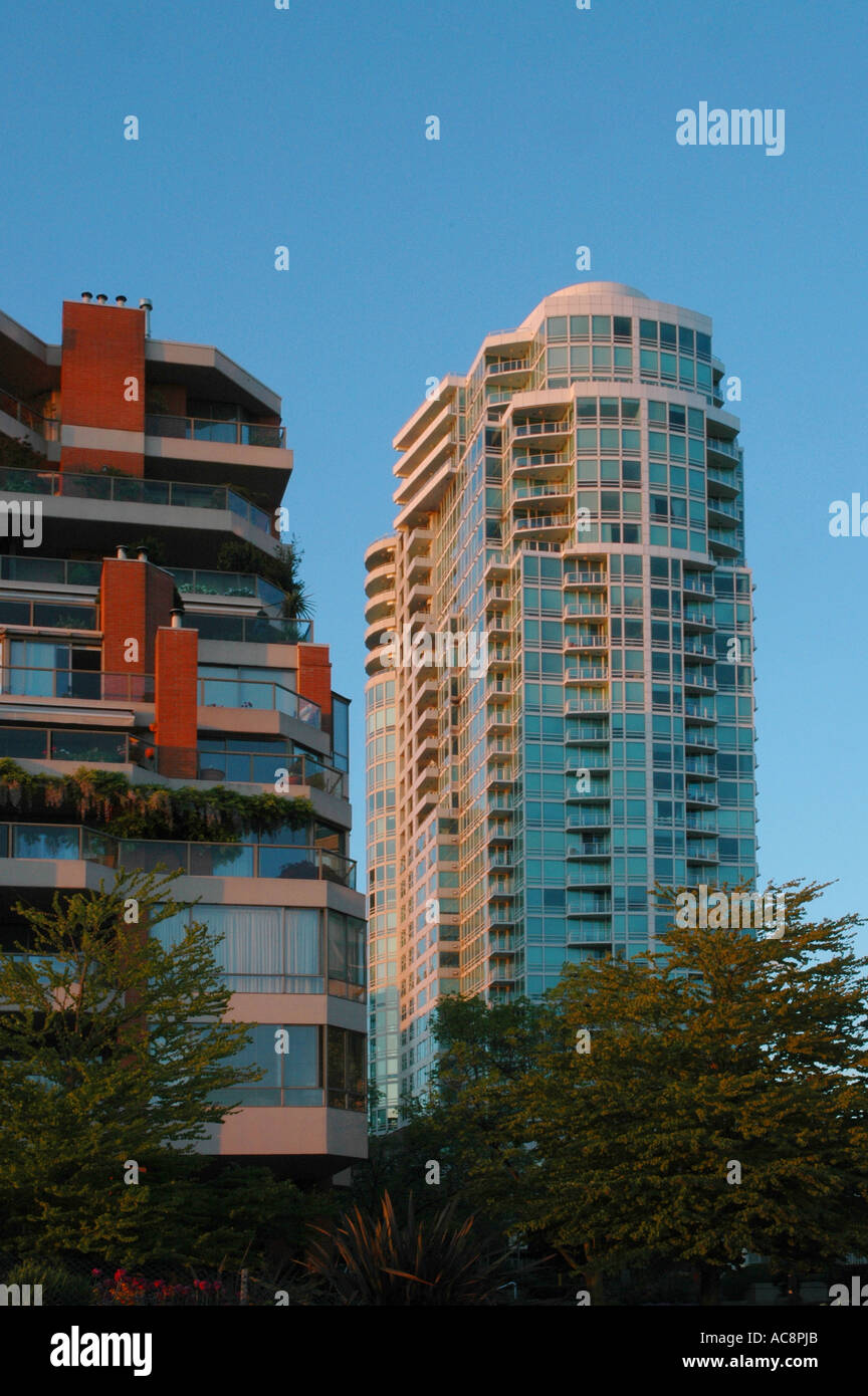 Condominium apartments illuminated by the late evening light of sunset, False Creek, Vancouver, Btitish Columbia, Canada. Stock Photo