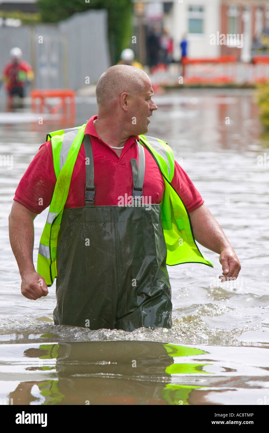 A council rescue worker in the unprecedented June 2007 floods in ...