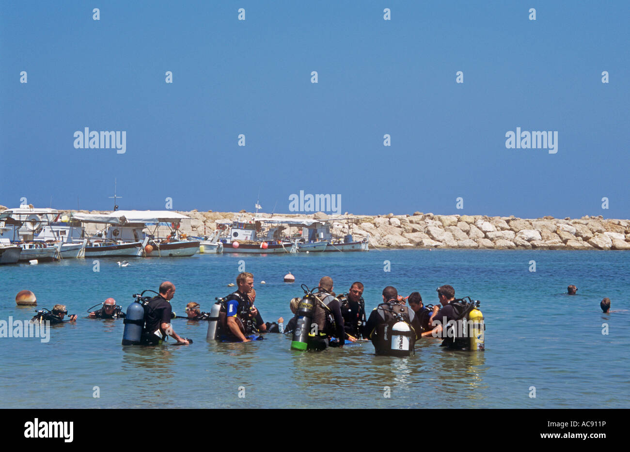 Preparing to Dive in Mandoulis Bay Cyprus Stock Photo