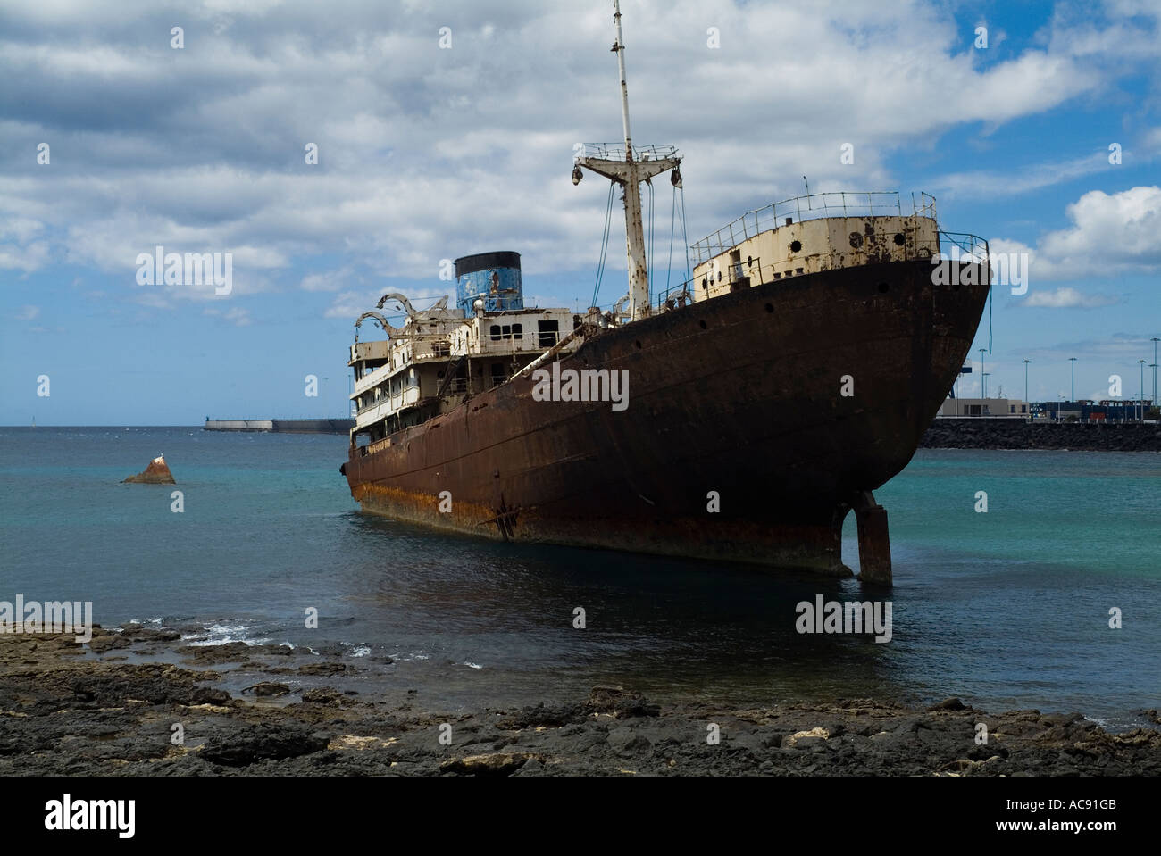 dh Arrecife harbour ARRECIFE LANZAROTE Greek merchant shipwreck ship wrecked marooned ashore wreck beach Stock Photo