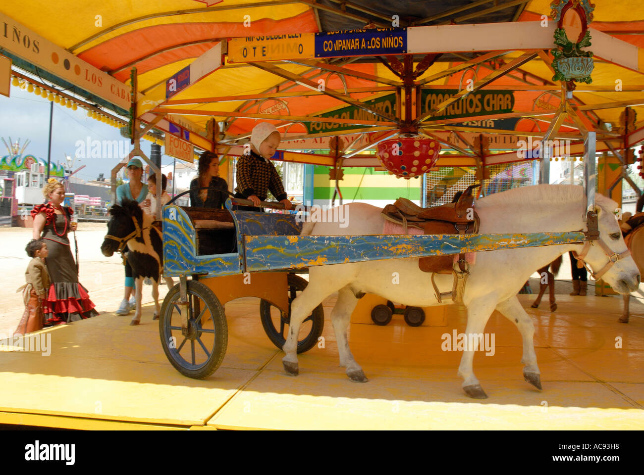 Pony fairground ride in Spain that uses real ponies Vejer feria
