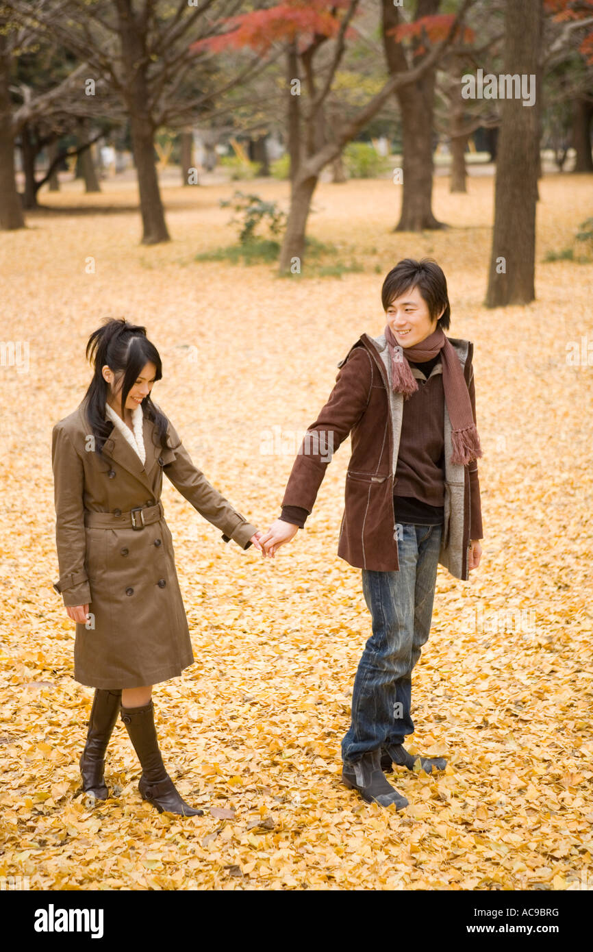 Young asian men holding hands hi-res stock photography and images - Alamy