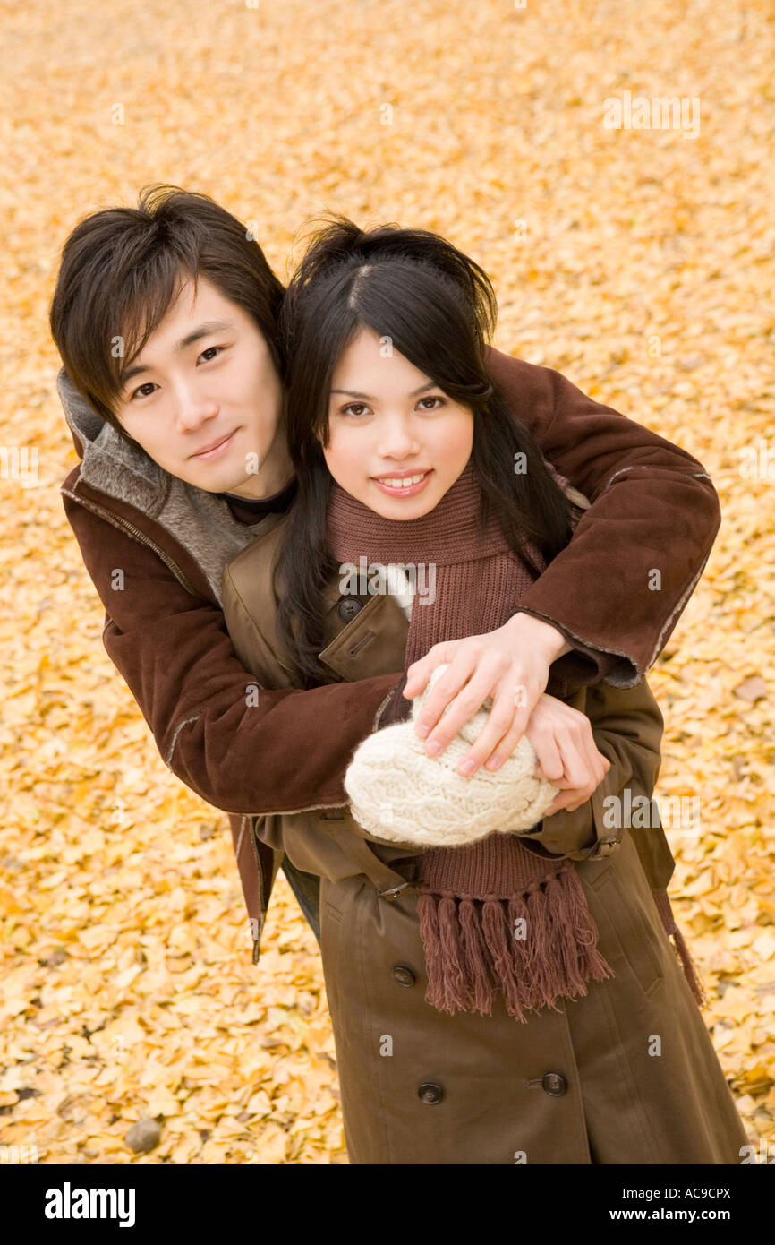Young couple looking at camera Stock Photo - Alamy