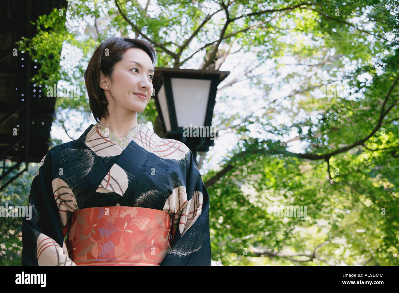 Smiling japanese women wearing kimono hi-res stock photography and ...