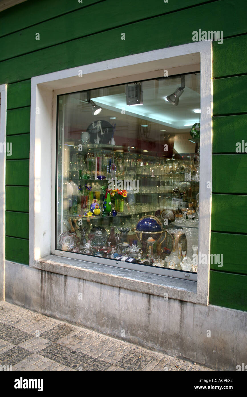 Glassware shop window display with various colorful items in Prague ...