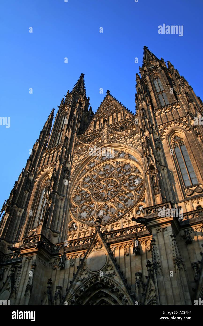 Gothic facade and spires of St. Vitus Cathedral against a clear blue ...