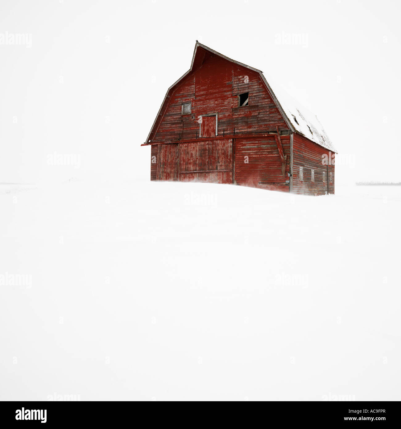 Red barn in winter landscape Stock Photo - Alamy