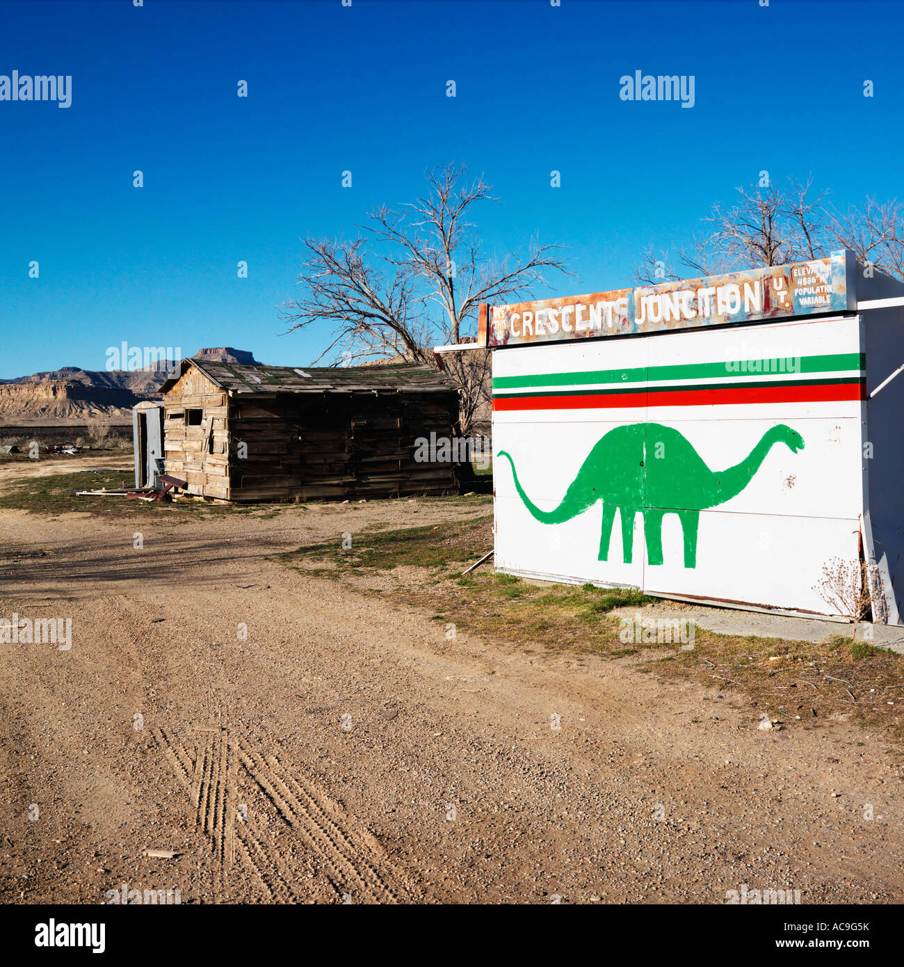 Small building iwht dinosaur painted on side in Crescent Junction Utah