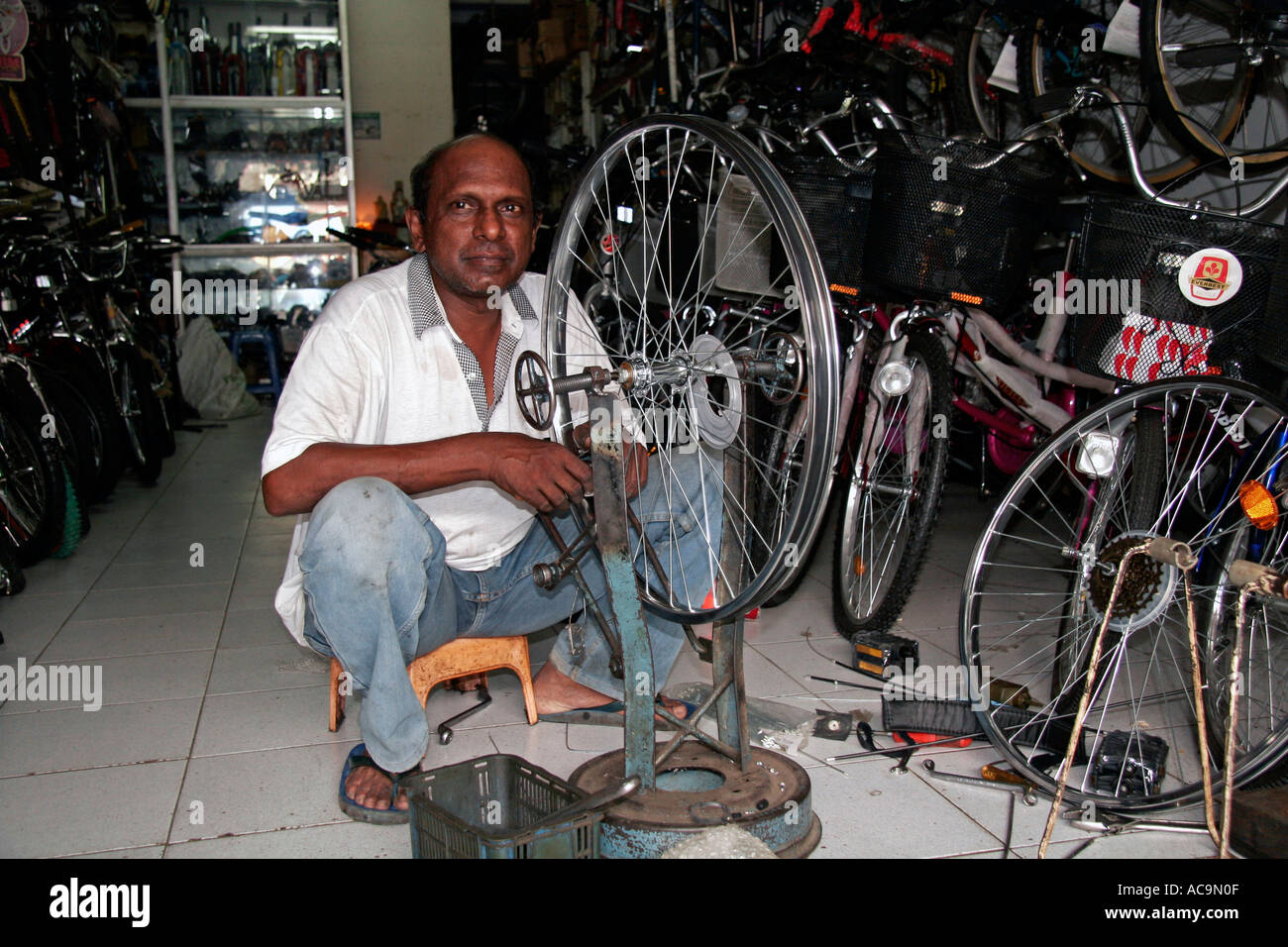 Bicycle Repair Man Medan Sumatra Indonesia Stock Photo Alamy