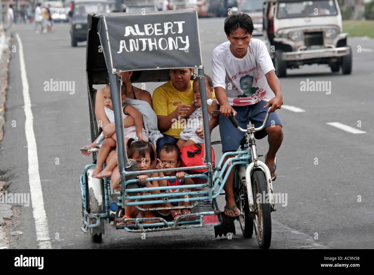 Family on bicycle taxi in Manila, Philippines Stock Photo 4272471 Alamy