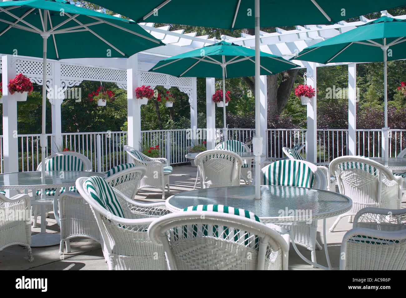 Restaurant Patio Deck With Chairs Tables Umbrellas Outside On A Summer