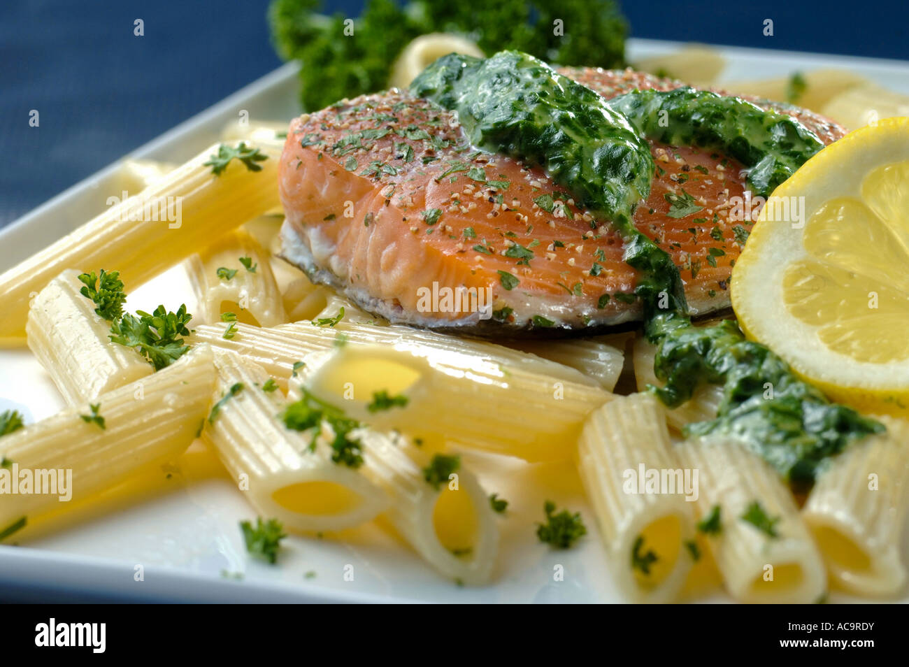 Salmon and spinach pasta Stock Photo - Alamy