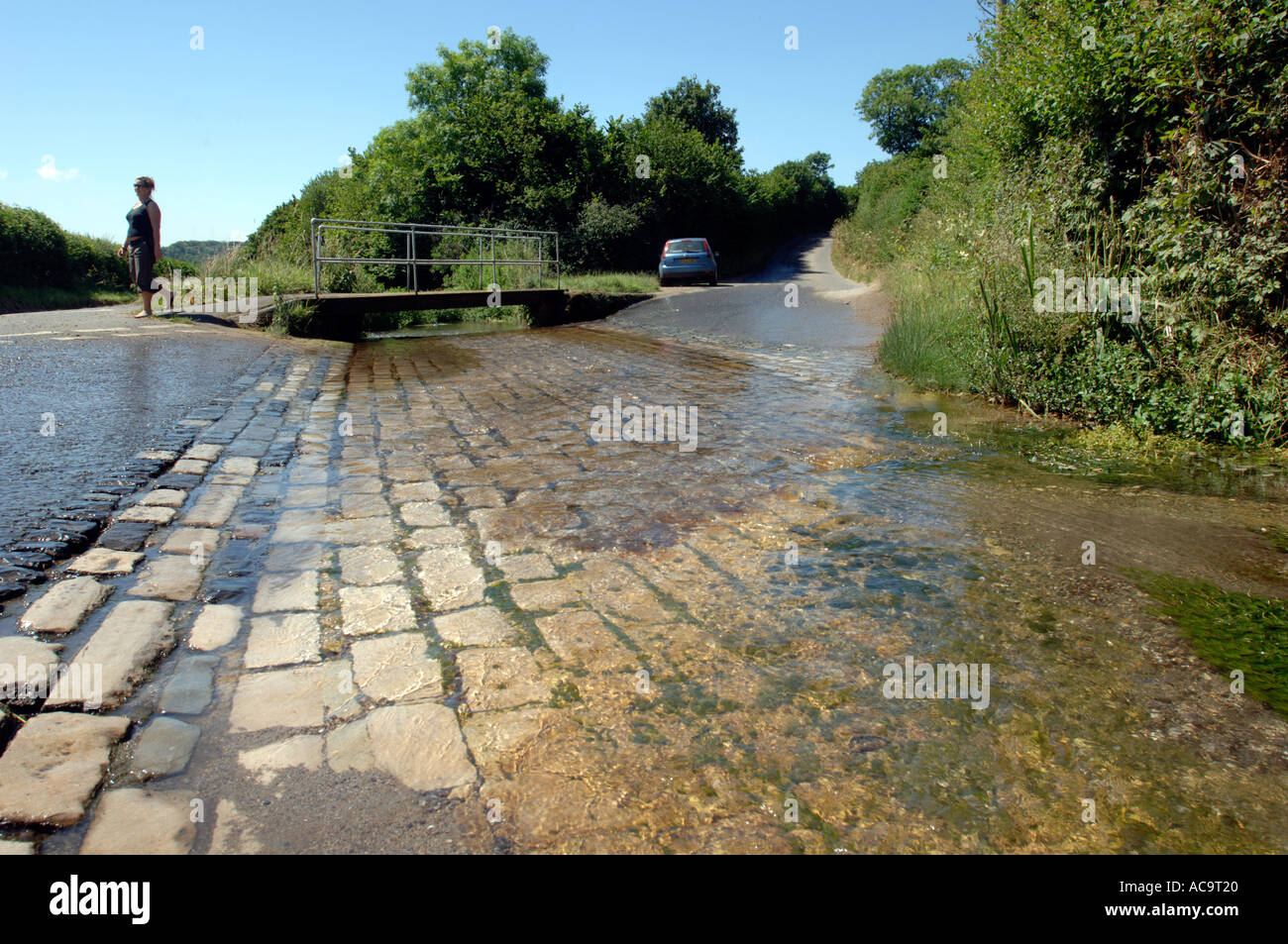 A ford river crossing at a road in the Piddlevalley in Dorset England