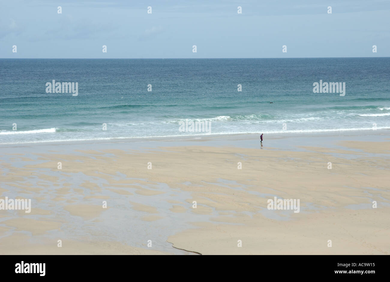 jogger on beach Stock Photo