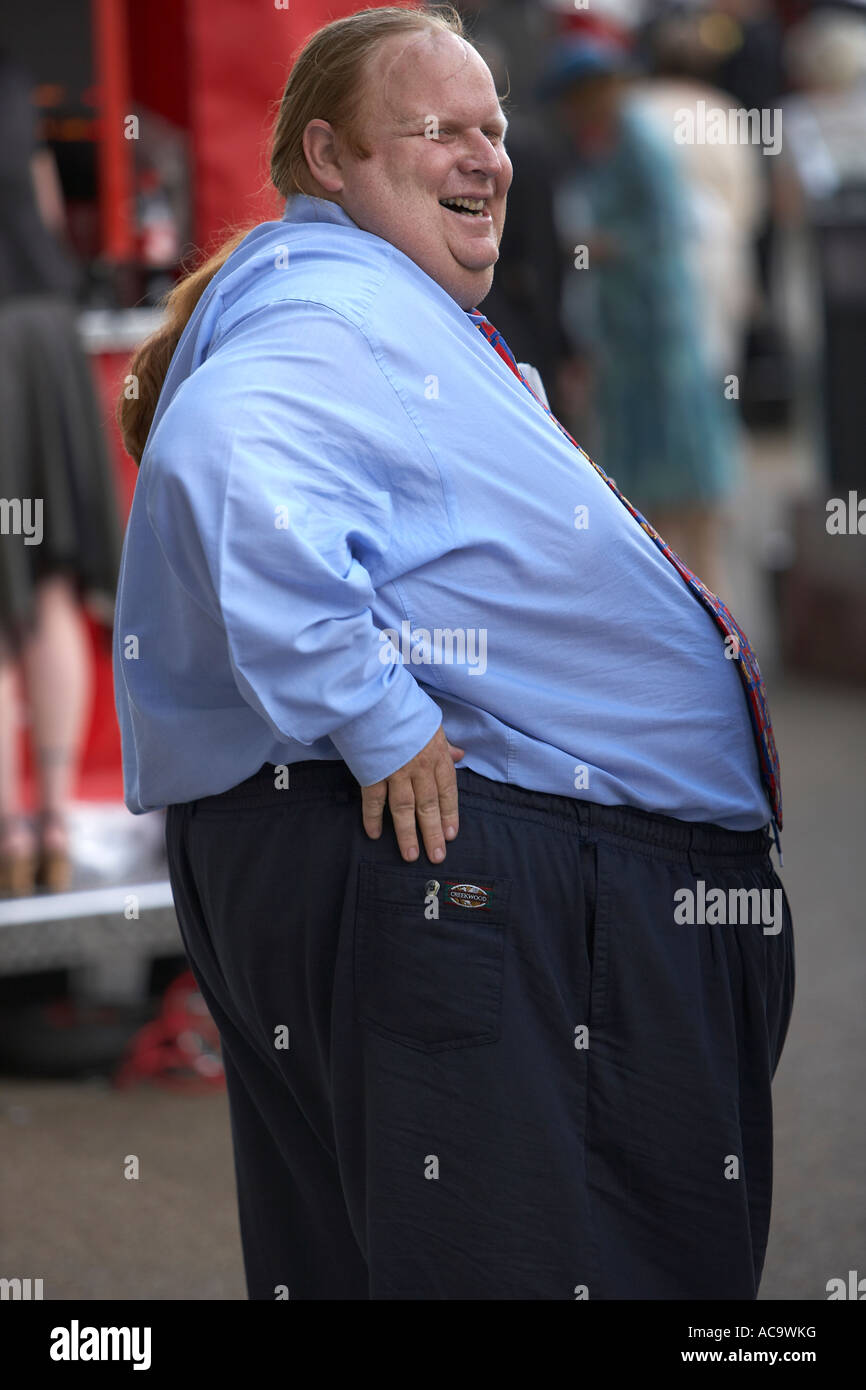 Fat Man with a Pony Tail at the Races Stock Photo - Alamy
