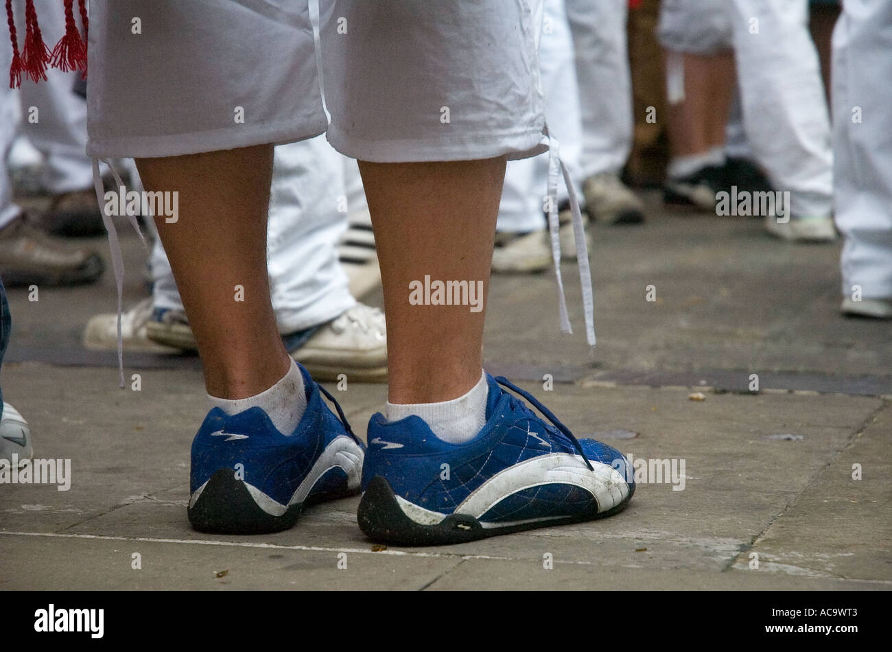 A runner waits for the bulls to be released into the streets San Fermin Festival Pamplona Spain Stock Photo
