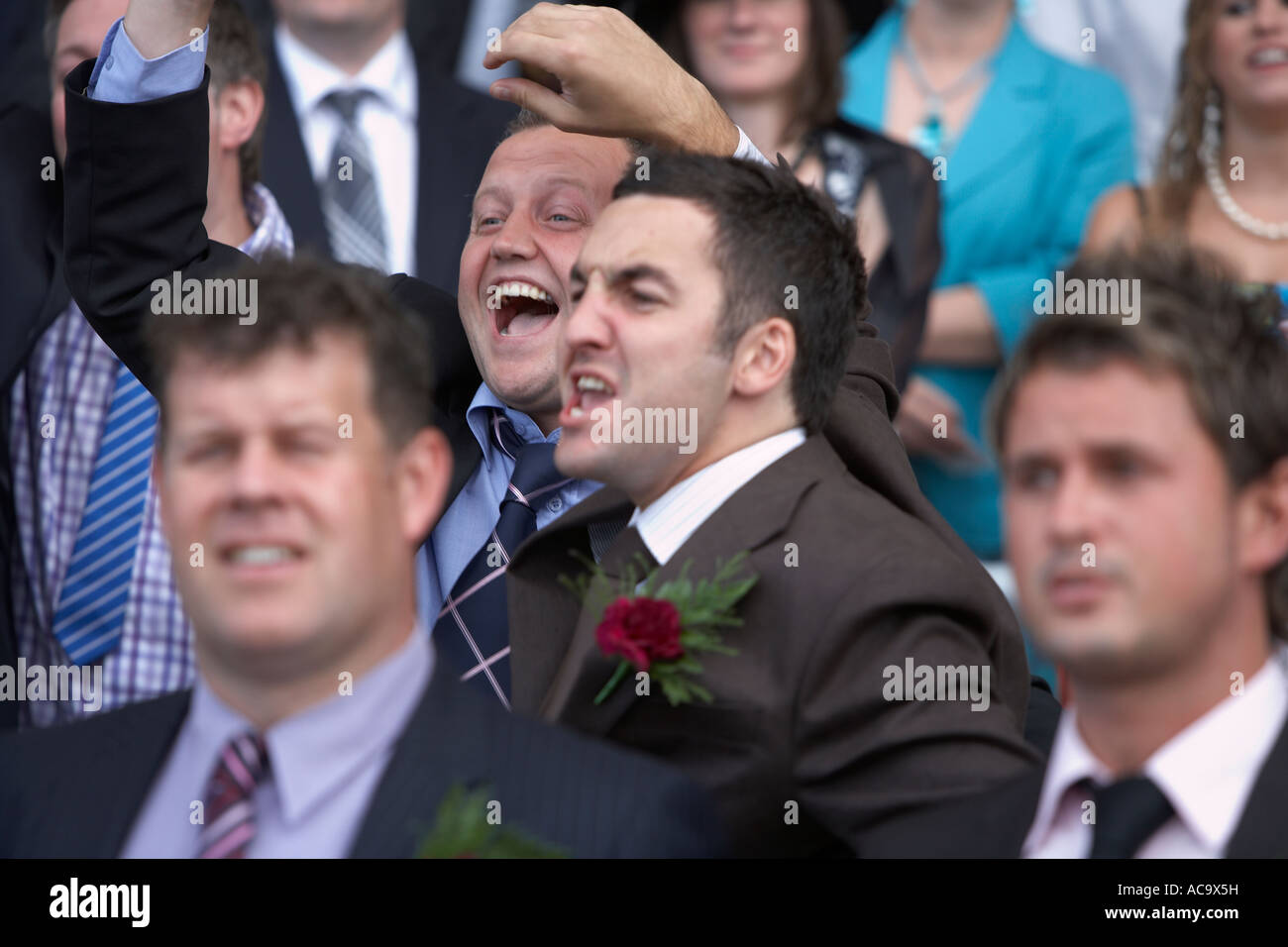 Boys having fun at the races Stock Photo - Alamy