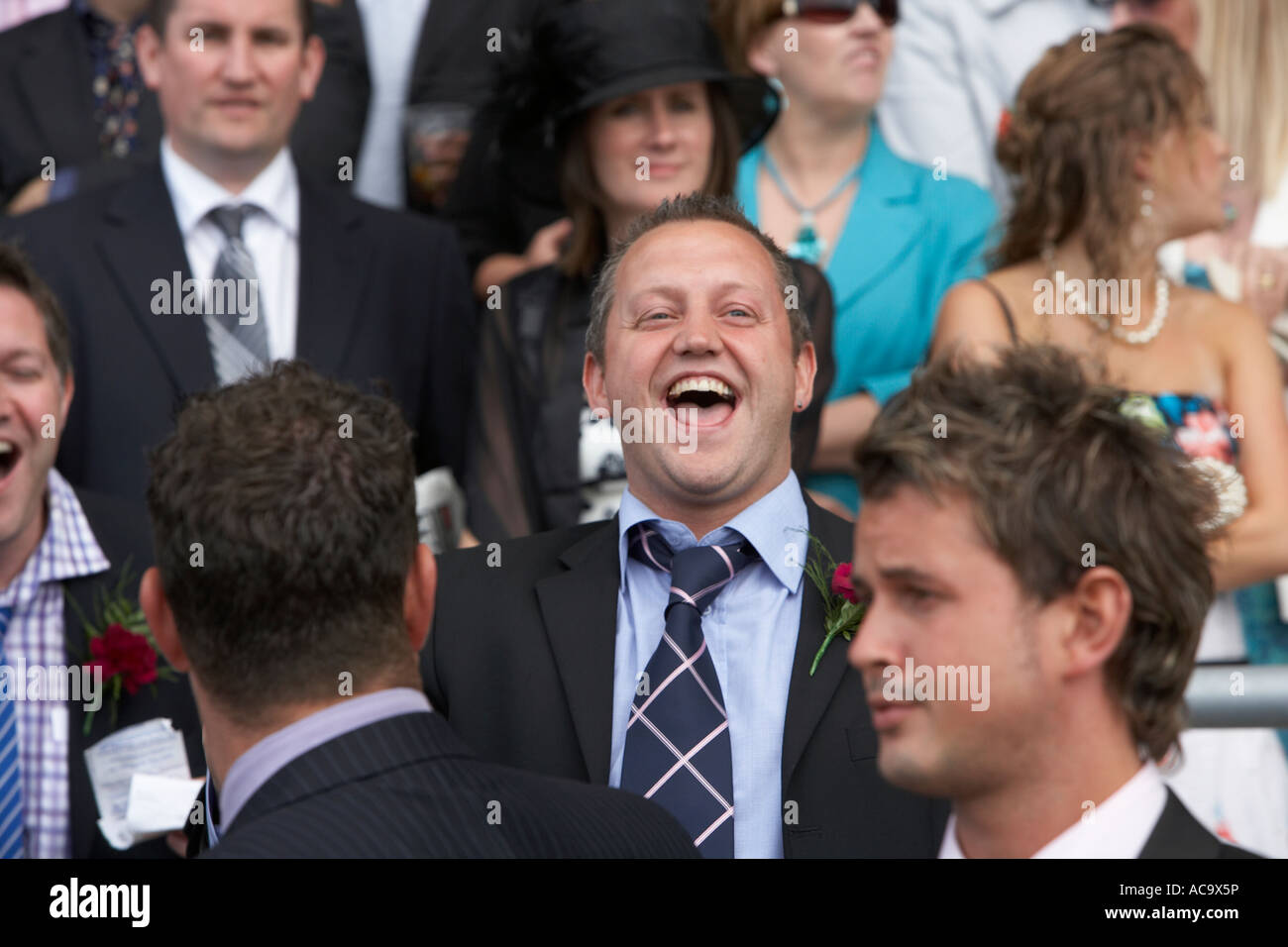 Boys having fun at the races Stock Photo - Alamy