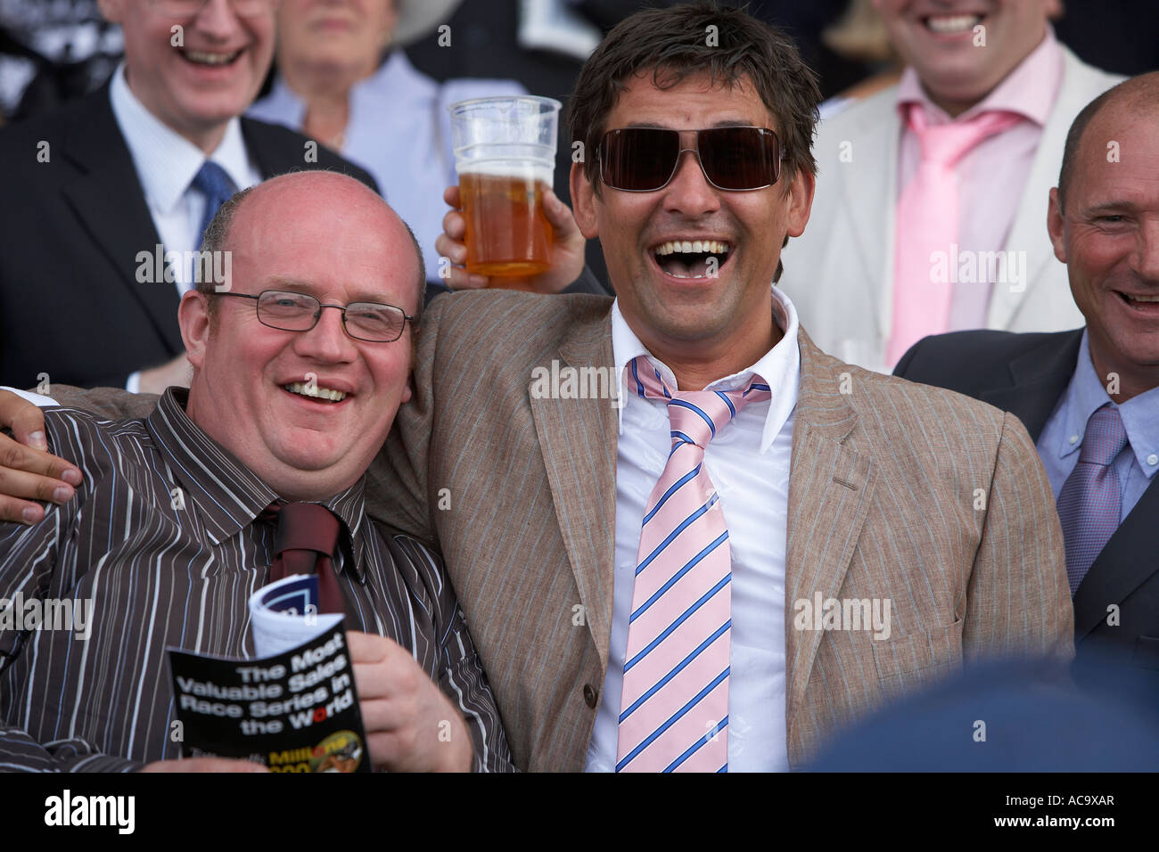 Boys having fun at the races Stock Photo - Alamy
