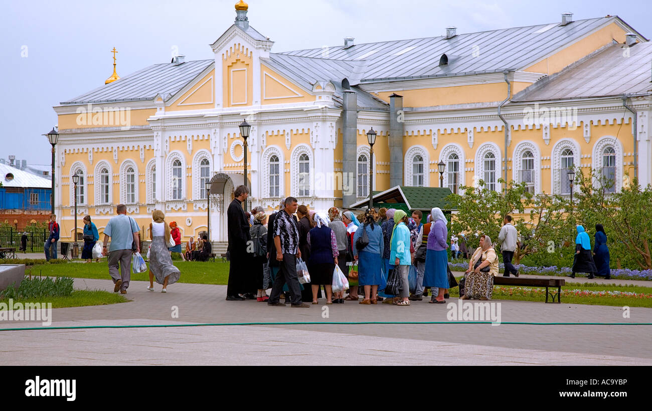 Convent building, priests and pilgrims, Diveyevo, Russia Stock Photo