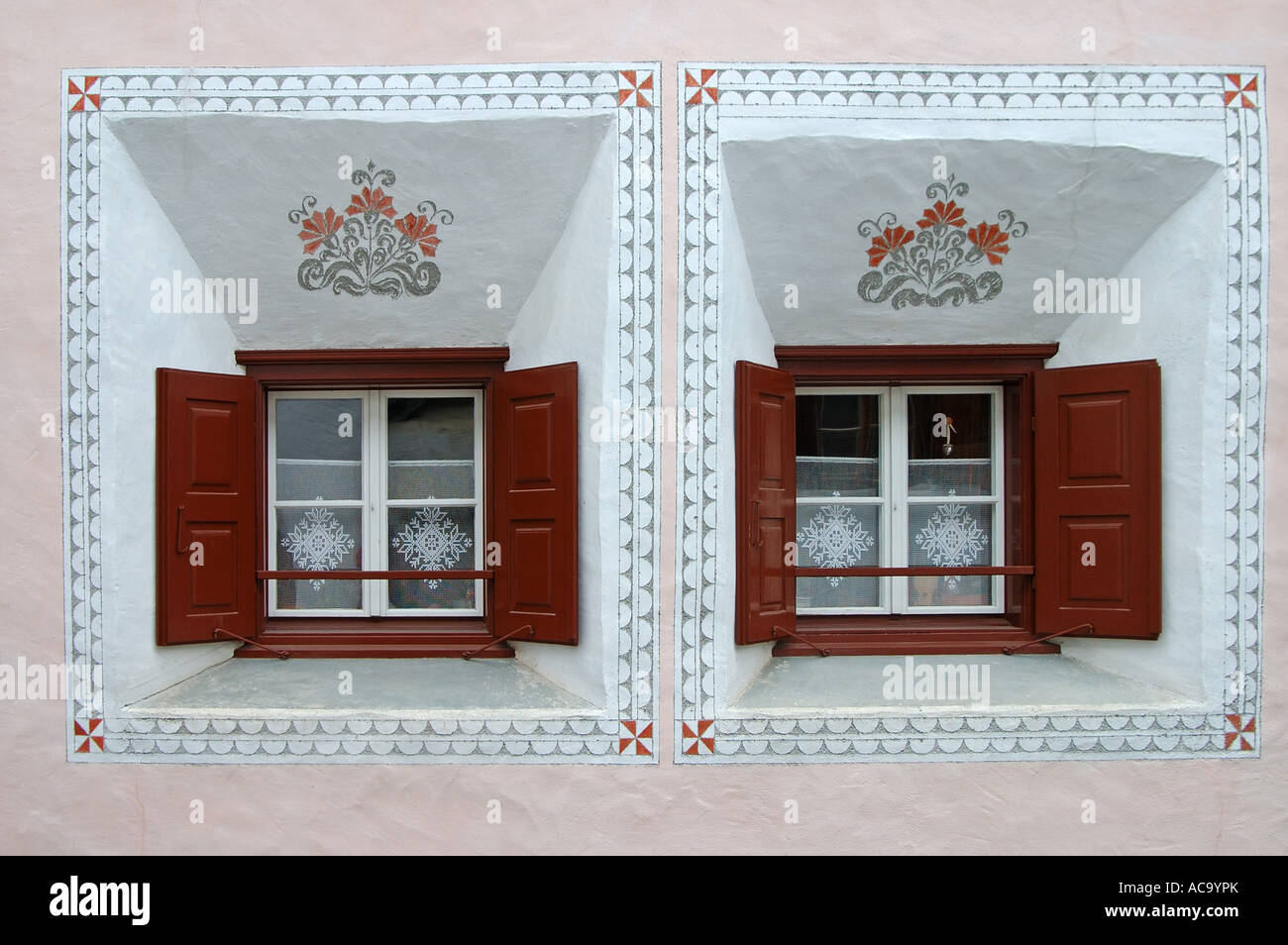 Windows of a typical Engadine house, Scuol, Engadin, Grisons, Switzerland Stock Photo