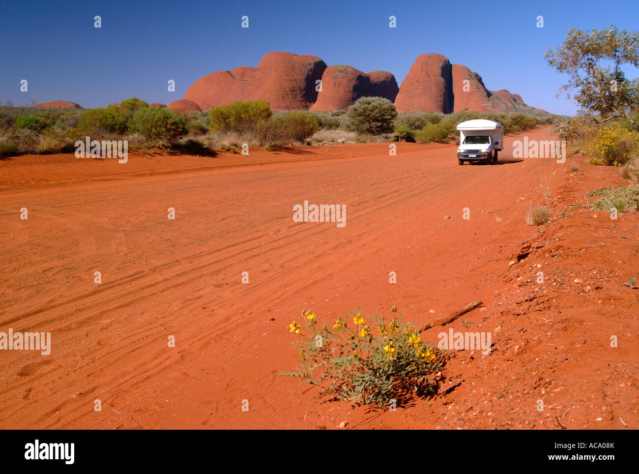 4WD driving on a dirt road in Uluru Kata Tjuta National Park