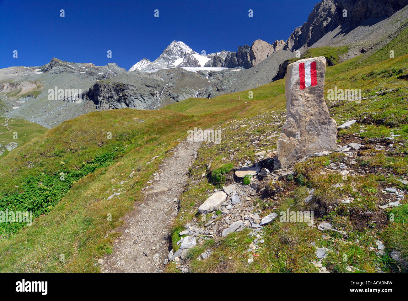 Trail in front of the peak of the Grossglockner, National Park Hohe Tauern, Tyrol, Austria Stock Photo