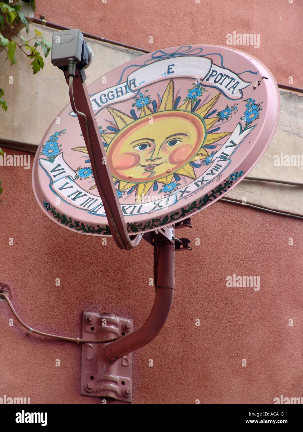 Satellite dish painted with a sundial, Taormina, Sicily, Italy Stock Photo