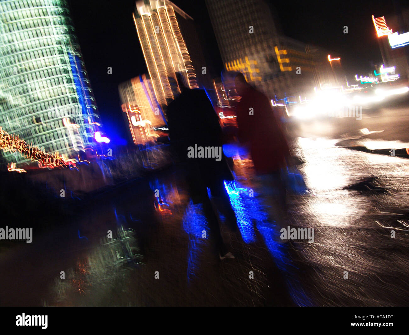 People at night at the Potsdamer square, Berlin, Germany Stock Photo