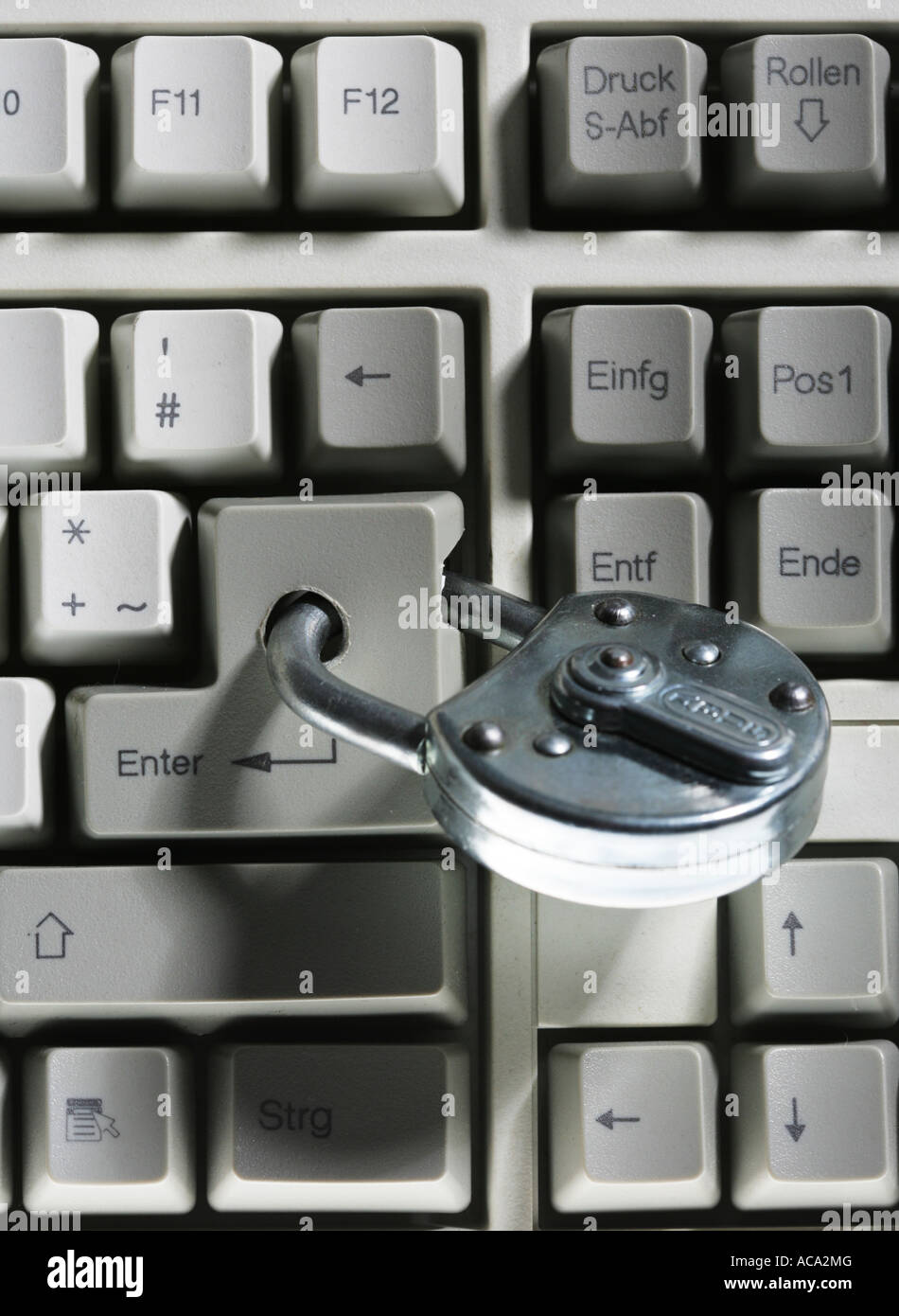 Symbolic photo, computer safety, keyboard with lock Stock Photo - Alamy