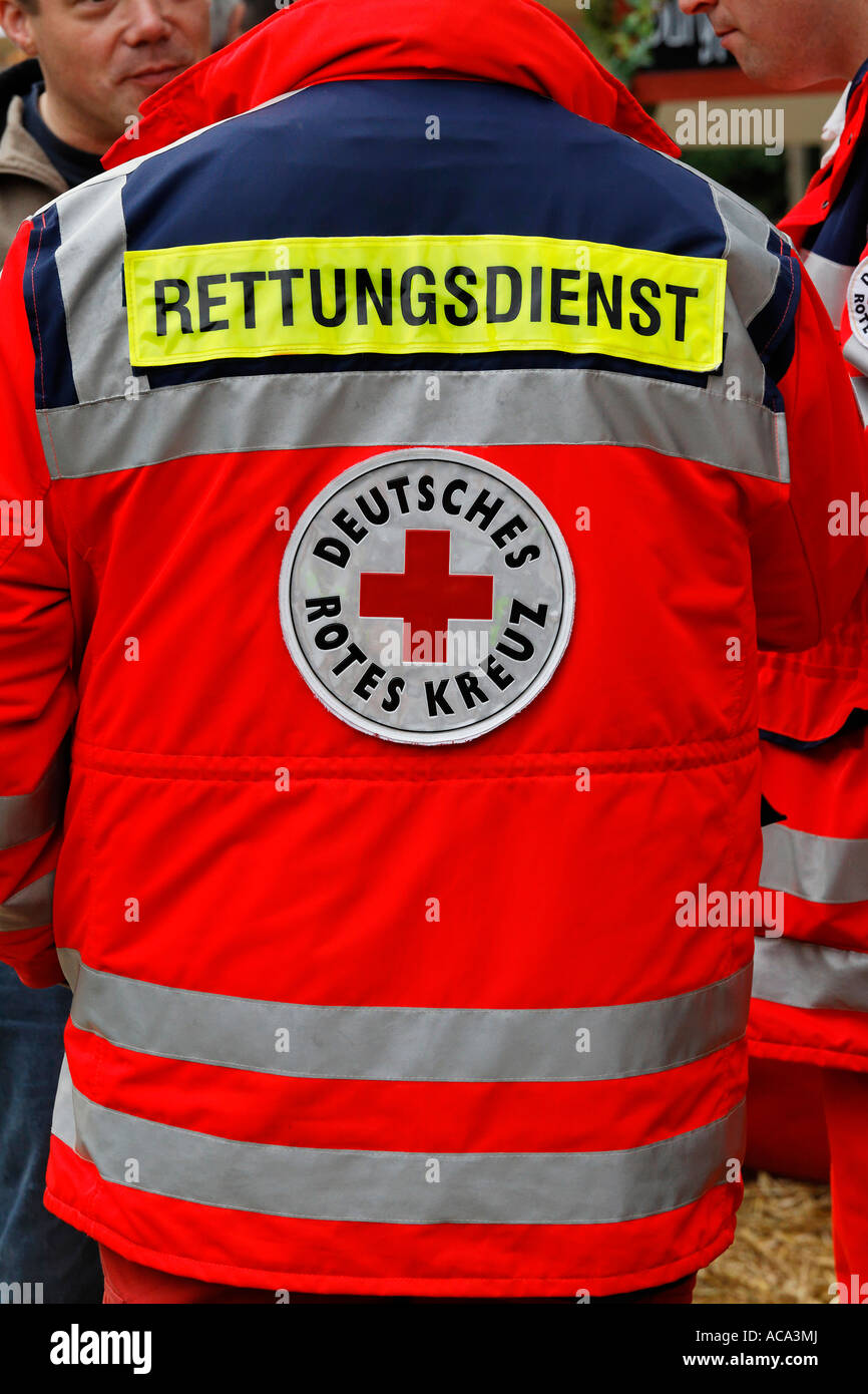 Signal red jacket of a German Red Cross member, rescue services, Germany Stock Photo