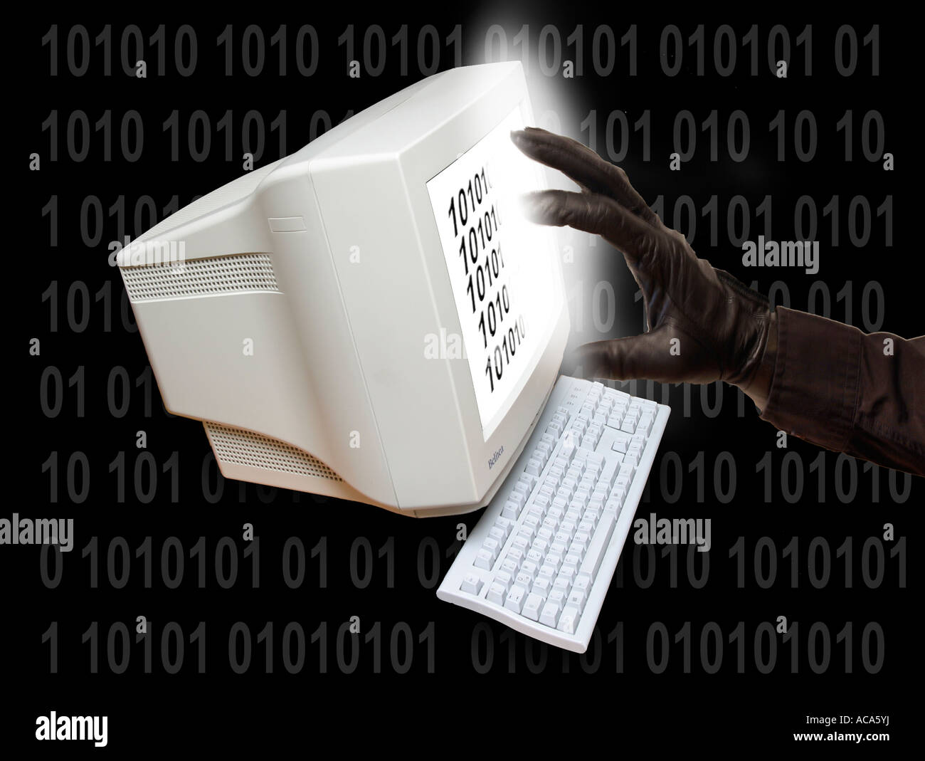 Hand with black glove reaches into a computer Stock Photo - Alamy