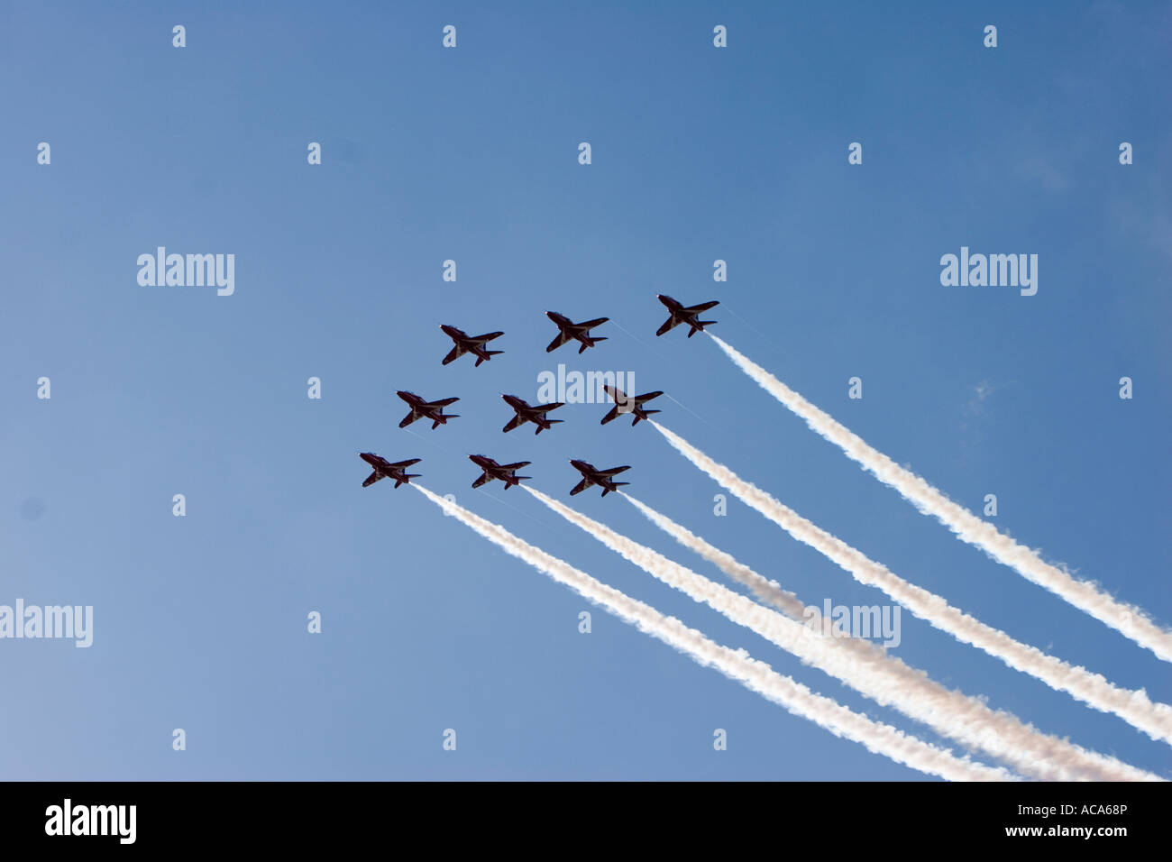 Aerobatic dsiplay from the red arrows of the RAF UK Flying Hawk 100