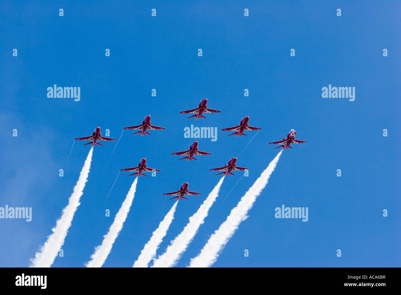 Aerobatic dsiplay from the red arrows of the RAF UK Flying Hawk 100