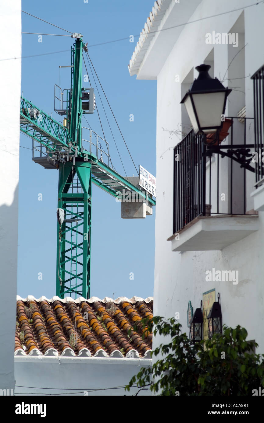 Spanish buildings. Crane on housing construction site southern Spain