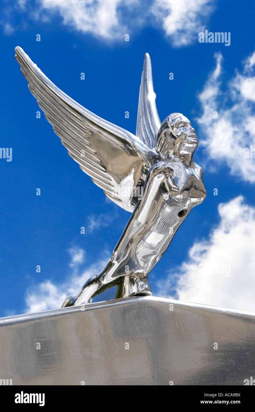 Excalibur limousine hood emblem Flying woman symbol over blue sky Stock Photo
