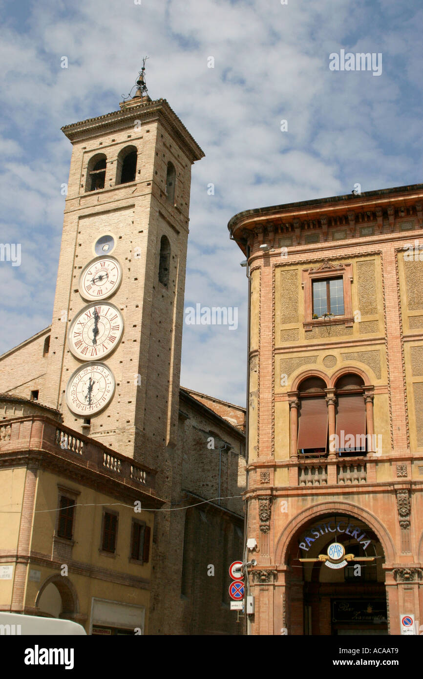 Quirky triple faced clock is a landmark in the charming historic city of Tolentino in Le Marche Italy Stock Photo