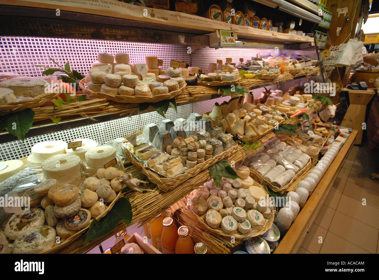 PARIS, FRANCE. Cheeses on display in a cheese shop in Montparnasse district  Stock Photo - Alamy