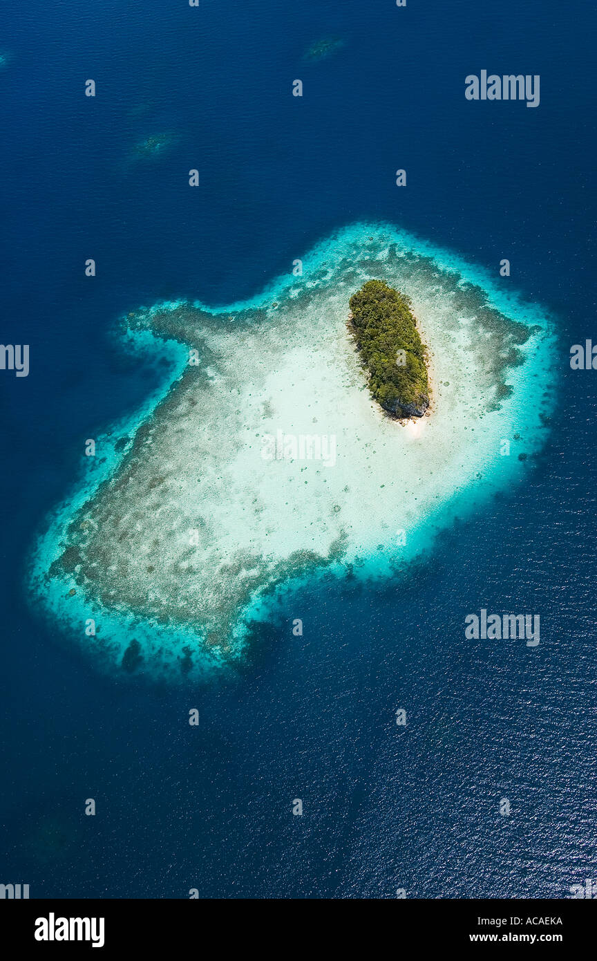 An aerial view of a single rock island the Rock Islands of Palau Micronesia Pacific Ocean Stock Photo