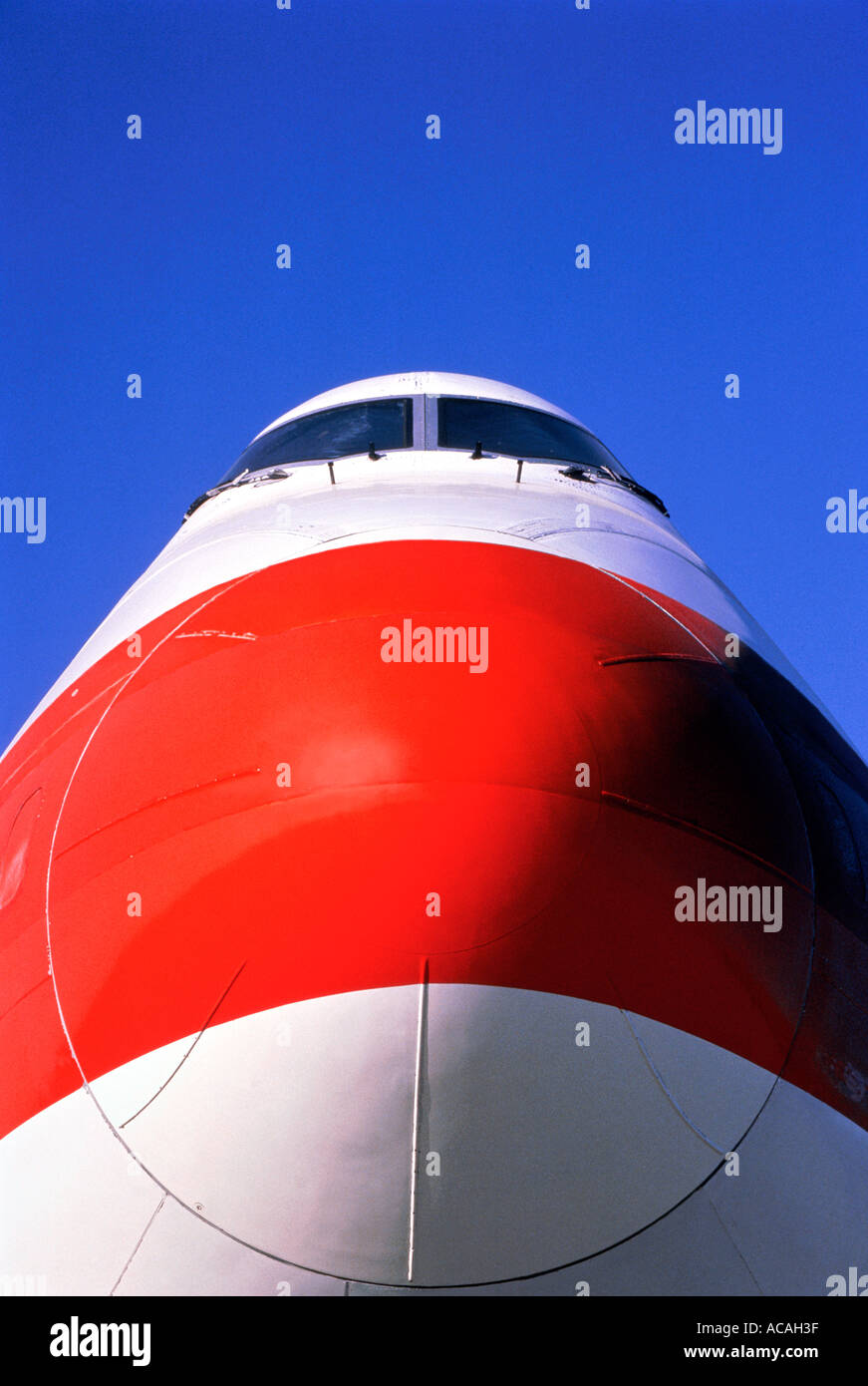 Boeing 747 jumbo jet nose red and white daylight with blue sky Stock Photo