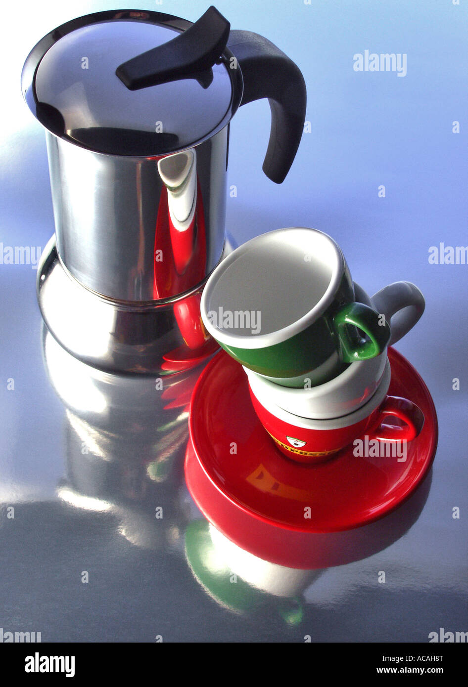 Coffee percolator with three cups in the colours of the italian flag Stock Photo