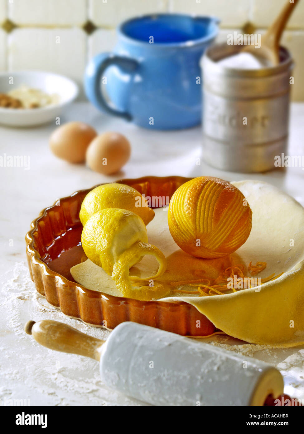 Ingredients for lemon cake: cake mixture, lemons, oranges, eggs, sugar Stock Photo