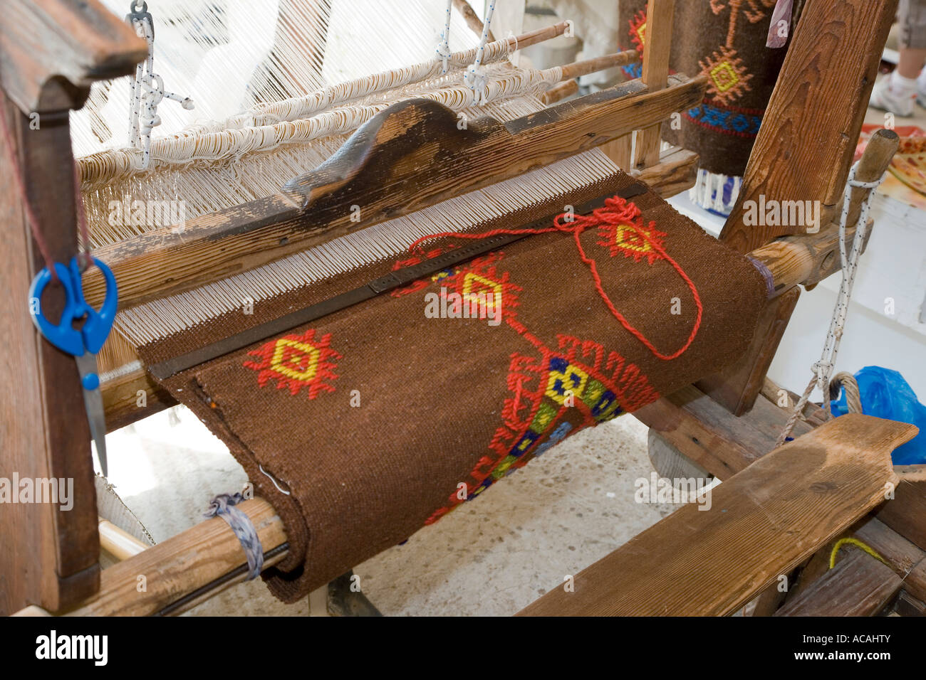 A weaving loom with a carpet on it, Crete, Greece Stock Photo