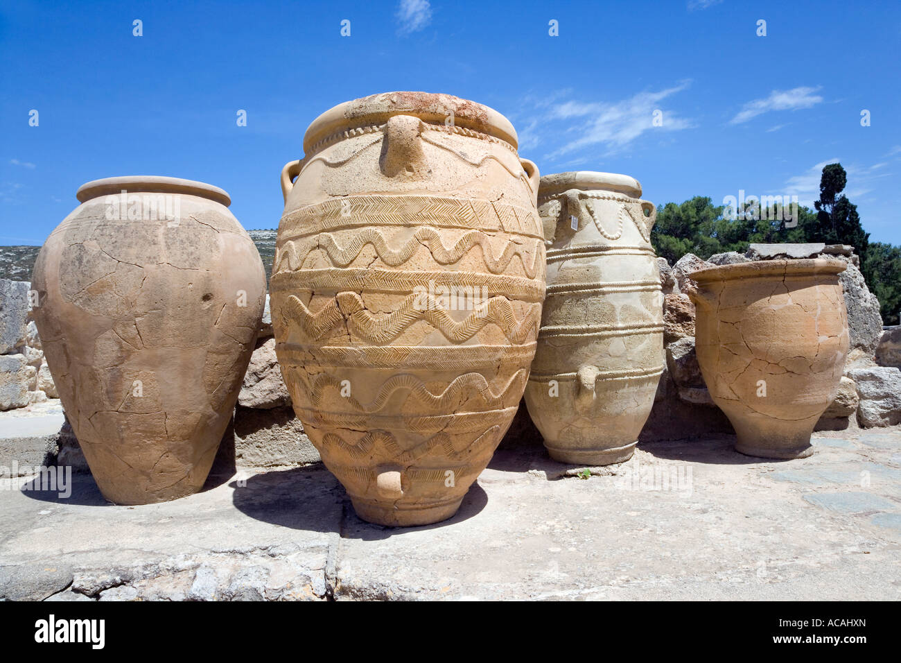 Four storage vessels, palace of Knossos, Crete, Greece Stock Photo