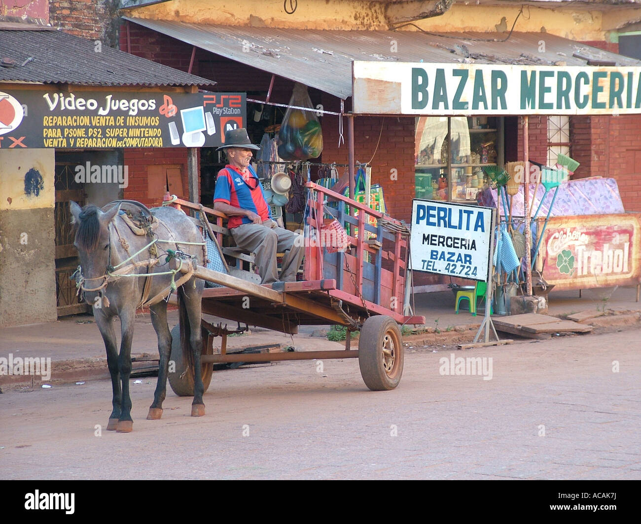 Typical way of transport: horse cart at the market of Concepcion , Paraguay Stock Photo