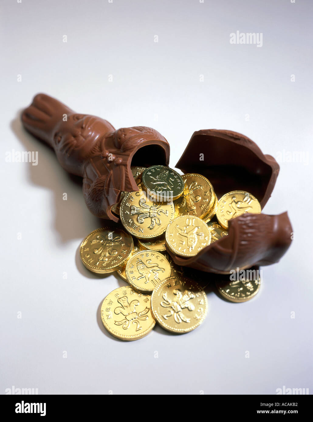 Chocolate Easter Rabbit with coins Stock Photo Alamy