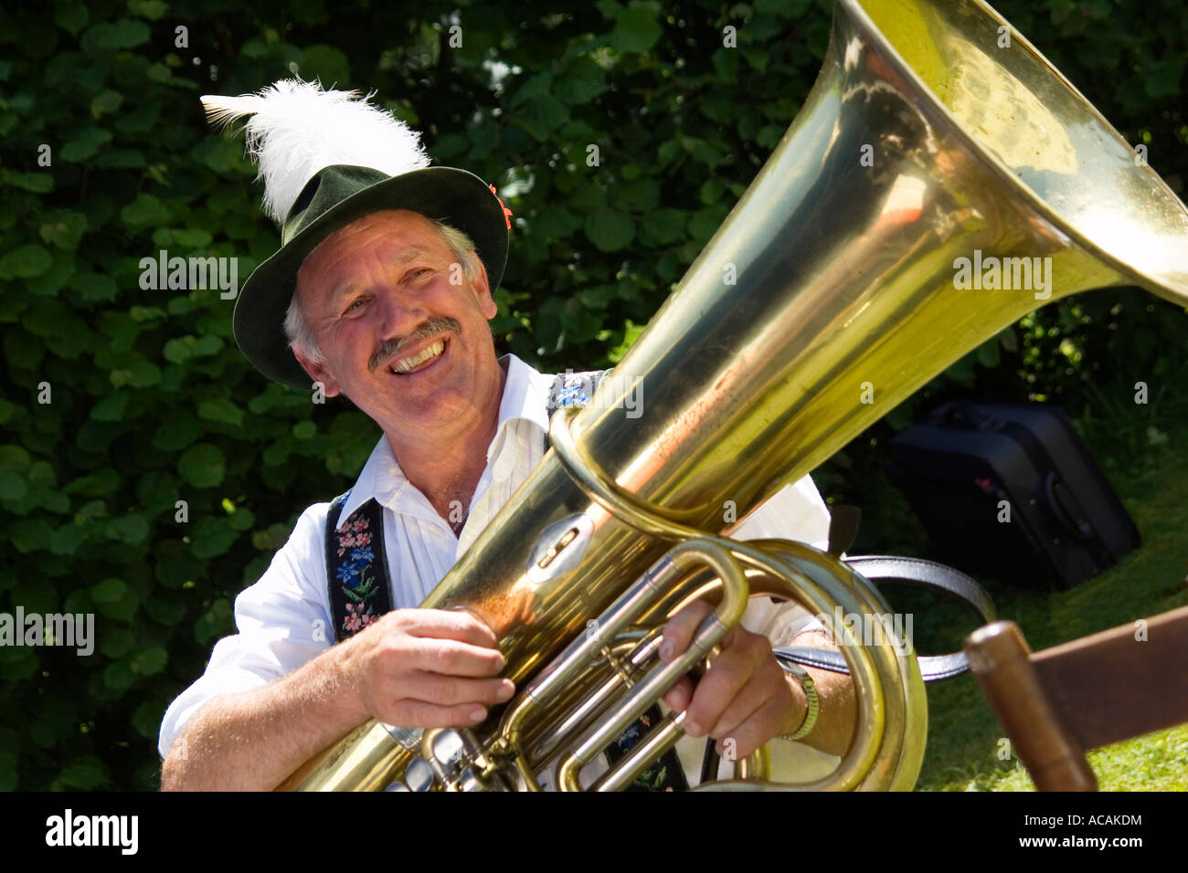 Bavarian tuba player in typical costume, Iffeldorf Upper Bavaria
